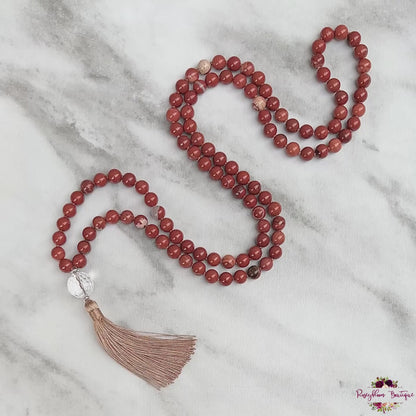 RED JASPER MALA | 108 Beads, Hand-knotted, Grade A Natural Gemstone Necklace with Clear Quartz Guru Bead